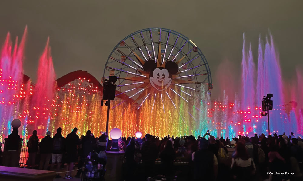Rainbow projections during World of Color in front of the Mickey Ferris WHeel