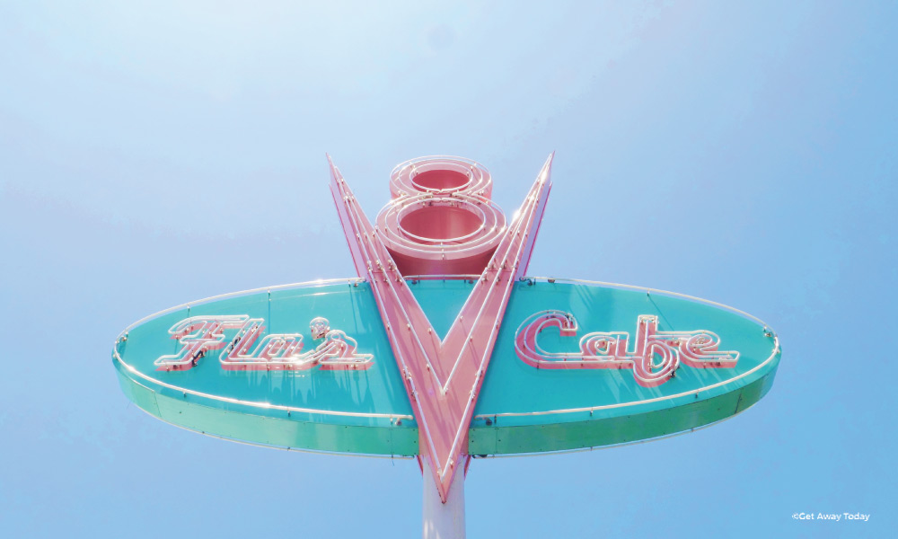Pink and Teal sign for Flo's V8 Cafe at Disneyland