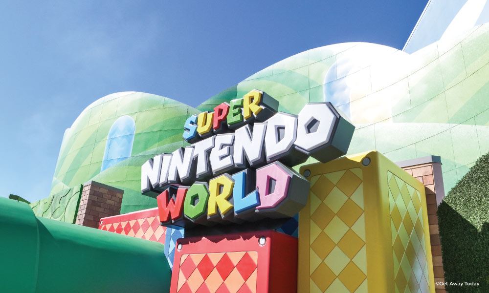 Colorful SUPER NINTENDO WORLD sign at land entrance