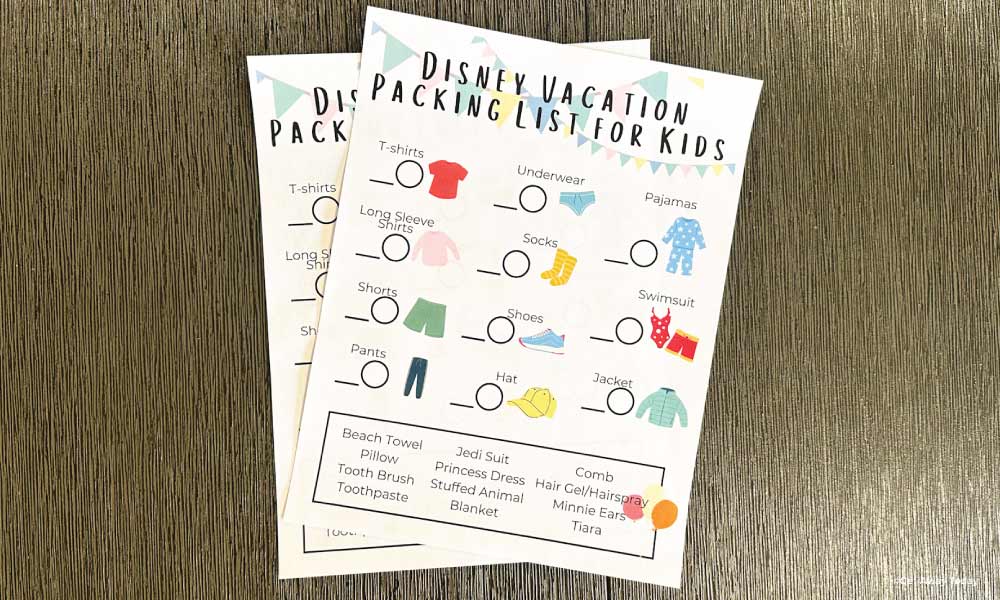 Printed out packing list for kids with items to pack for a disneyland vacation