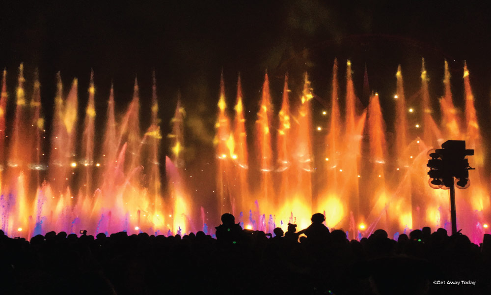 Night view of World of Color with Orange Projections