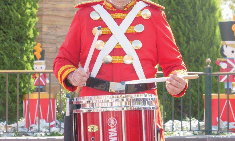 Dummer dressed as a toy solider - close up on drum