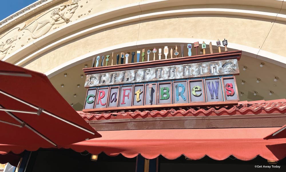 Sign that looks welded together in an artsy way saying "Craft Brews" at the Food and Wine Festival