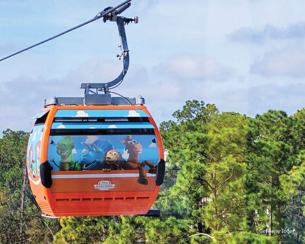 Orange skyliner cart with slinky dog, Rex, Bullseye and Trixie in the window