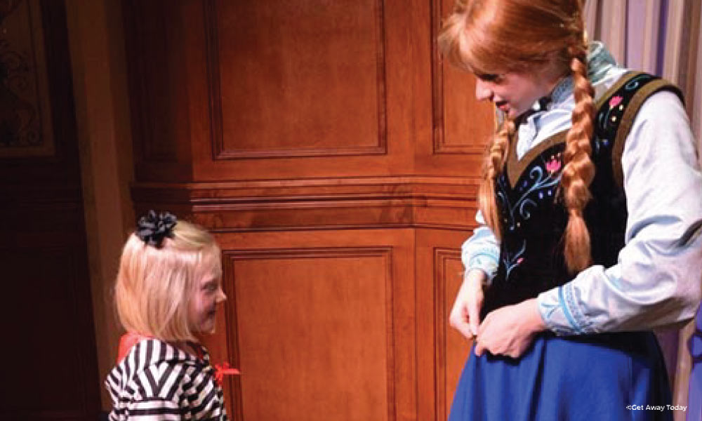 Little girl meeting Anna at the Art of Animation Building