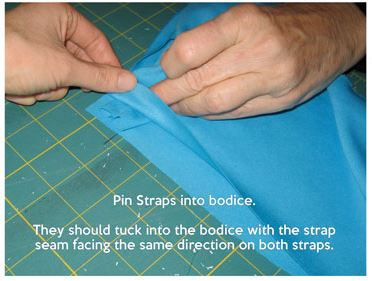 Pinning straps to the bodice before sewing together