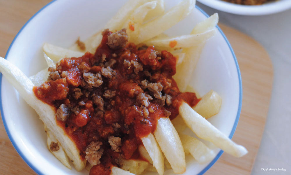 Fries with meat sauce on top