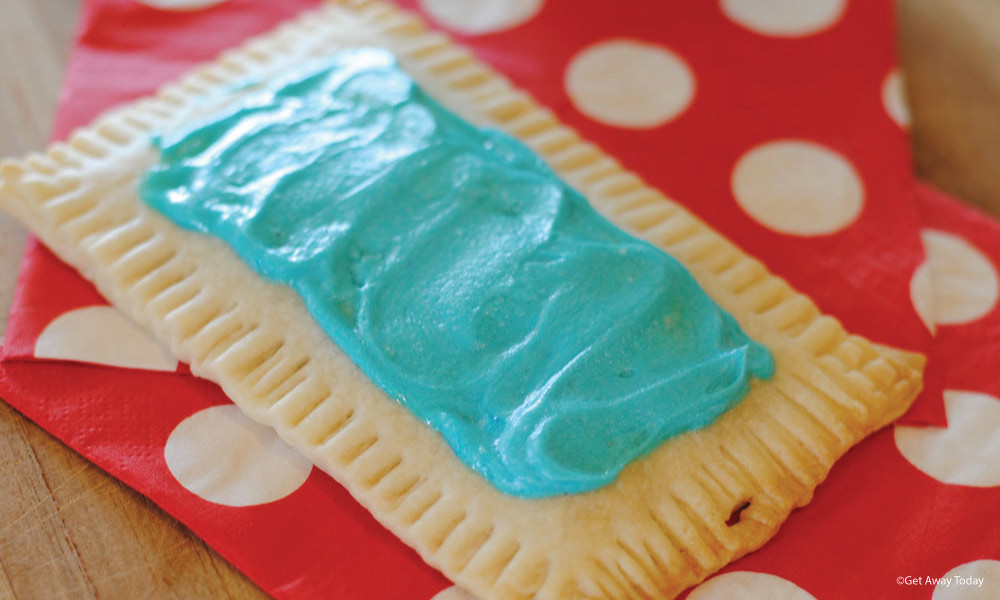 blue frosting spread on a homemade pop tart