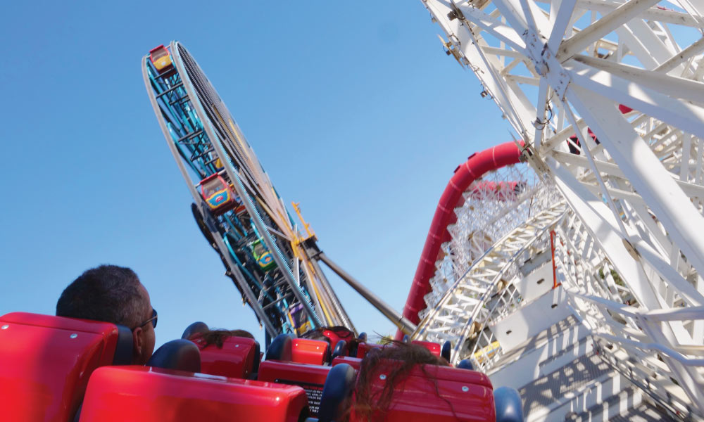 View from riding the Incredicoaster with a view of Mickey's Pixar Pal Around Carousel