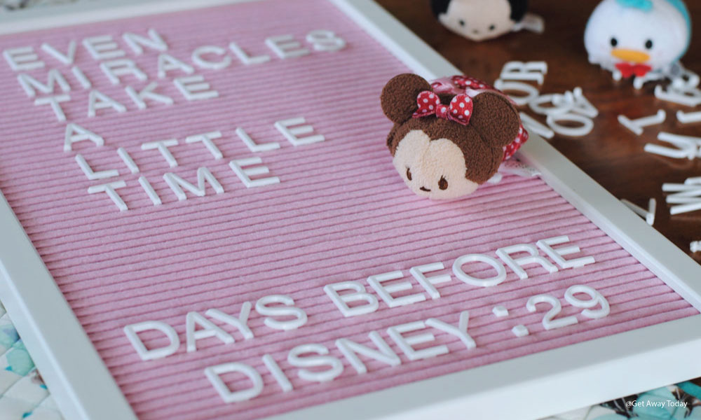 pink letterboard with a disney quote and minnie mouse stuffy