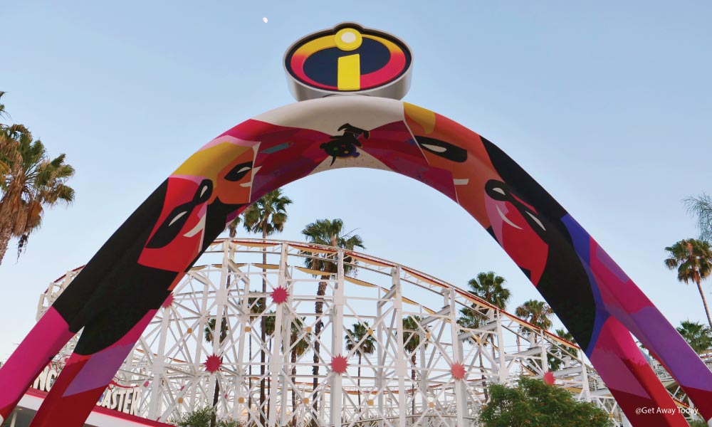 Arch with Modern depitctions of the incredible family leading to the incredicoaster