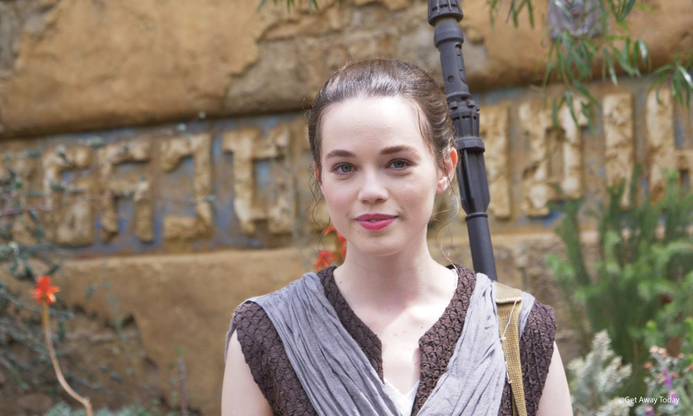 Rey smiling at the camera